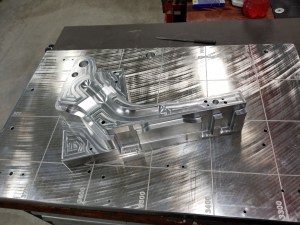Photo of and automotive check fixture machined at SIM in Hastings Michigan.
